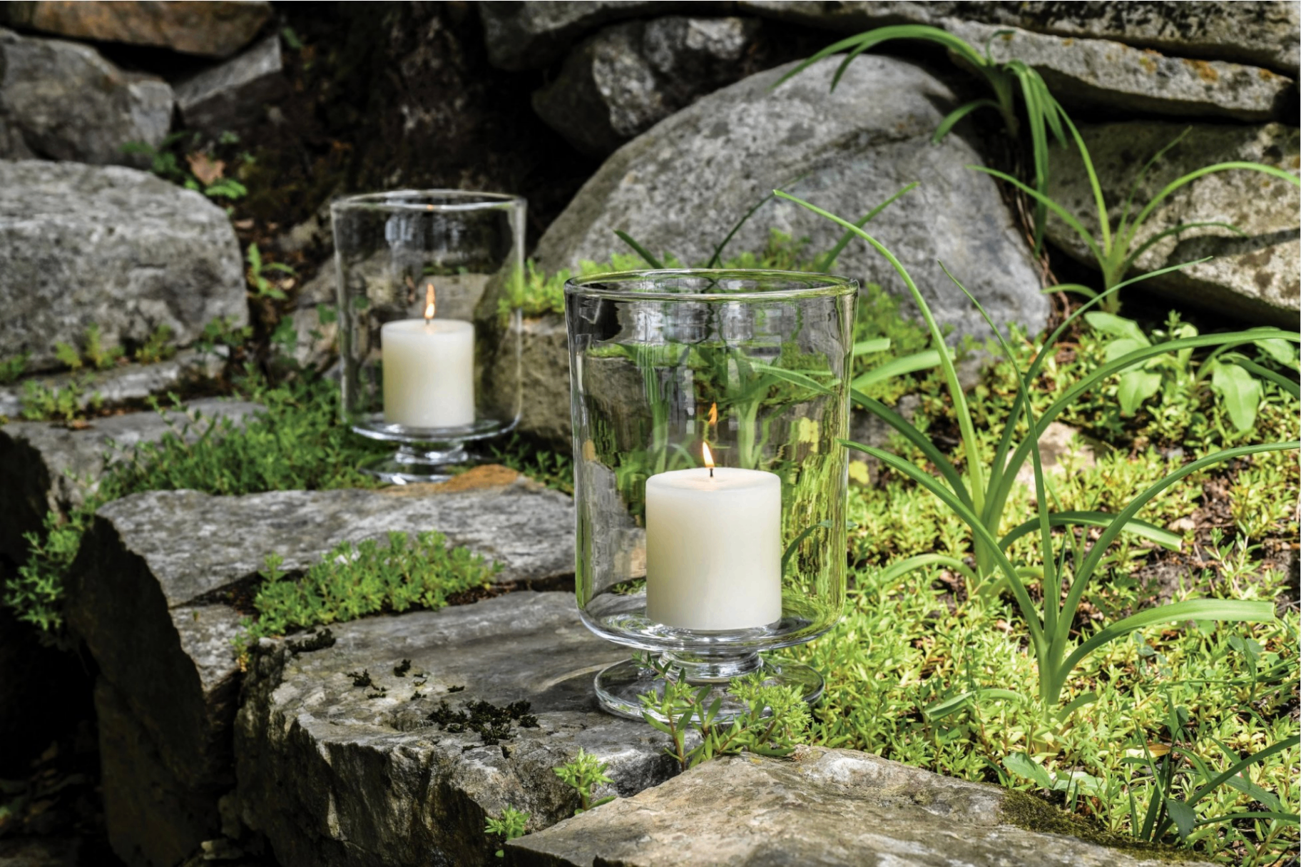 Hurricane candles in a stone garden — The Silk Road